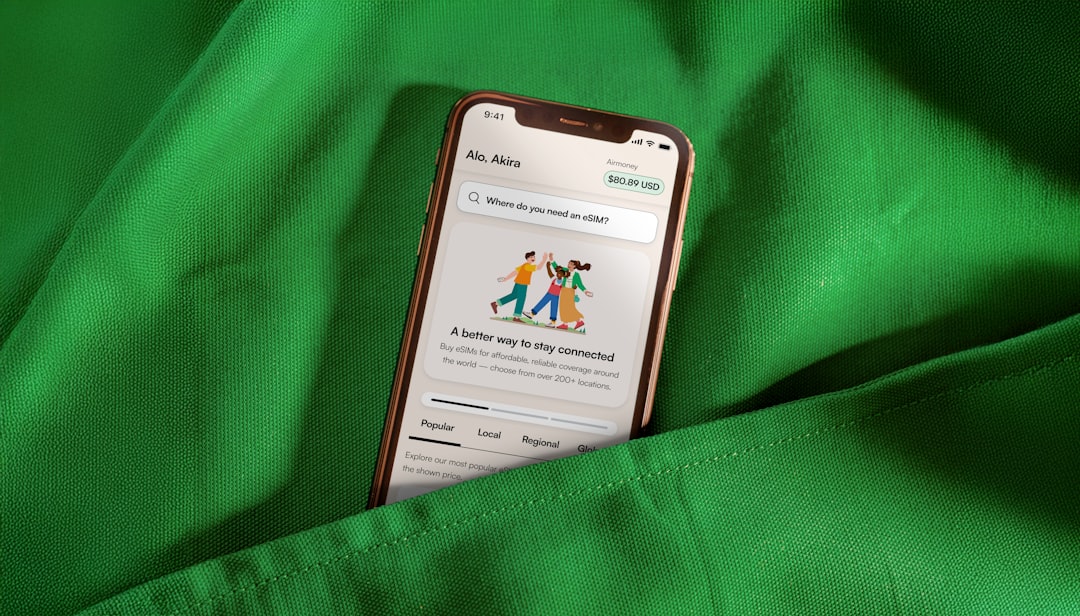 Smartphone displaying a health app on green fabric